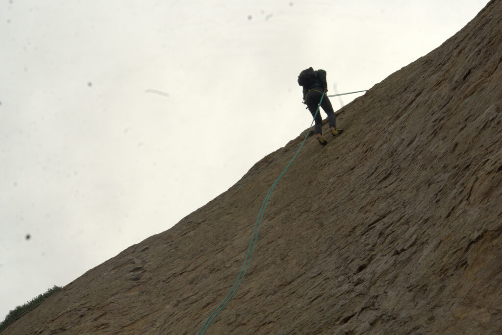 Belaying while rock climbing